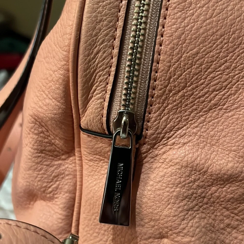 Michael Kors Rhea Medium Silver-Ringed Backpack with Fur Pompom in Coral…